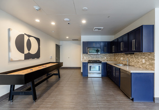 Kitchen and shuffleboard table at Ladd Tower