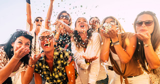 Group celebrating with confetti
