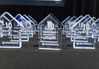 Years of service trophies lined up