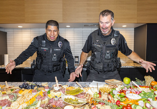 Milwaukie Police eye the charcuterie table