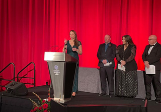 Tina Langdon accepting her award