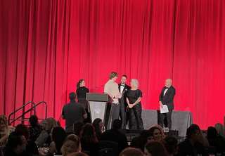 Griffin Hendrix on stage to accept his award