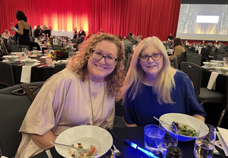 Debbie Engen and Lean Fox-Lewis at dinner