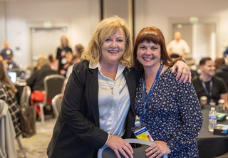 Two women posing together