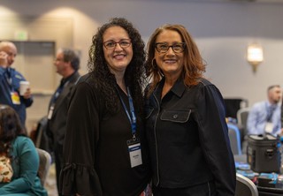 Two women posing together