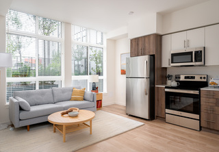 Kitchen and living area of apartment at Tiller Terrace