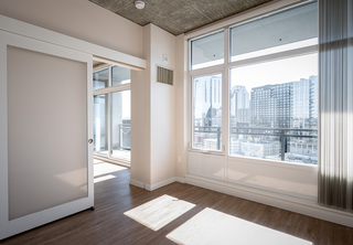 Apartment living area with large windows