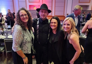 Team celebrating with Robert