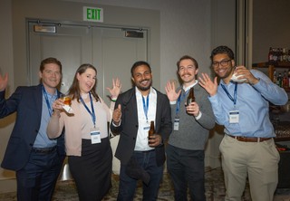 Group of five posing for the camera