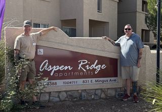 Kevin and Gary by the Aspen Ridge monument sign