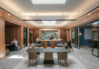 Co-working area with tables, booth and counter bar