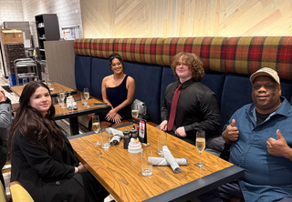 Group celebrating at a table