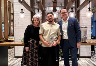 Tata posing with Josh and Melody