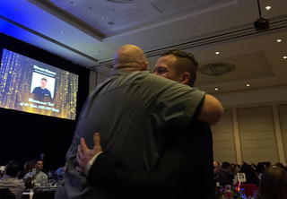 Kevin and Steven celebrating Steven's award