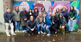 Guardian group photo outside of Rose Haven